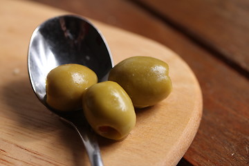 Image showing filled olives on a spoon