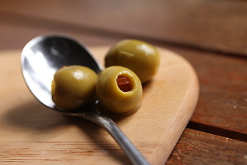 Image showing filled olives on a spoon