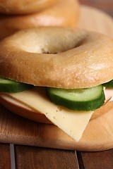 Image showing fresh cheese and ham bagel 