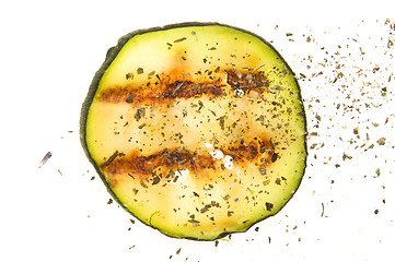 Image showing Grilled organic zucchini slices with herbs and spices