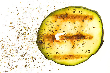 Image showing Grilled organic zucchini slices with herbs and spices