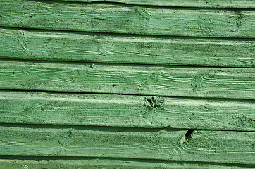 Image showing Background of old wooden board wall painted green 