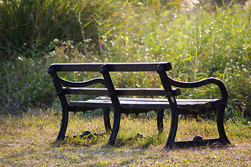 Image showing Chairs in countryside under sunshine