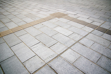 Image showing Traffic route for blind peoples with cobblestones 