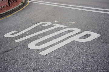 Image showing Stop sign on the ground