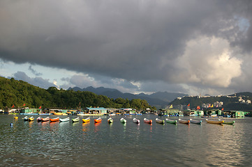 Image showing Coastal landscape with many boats