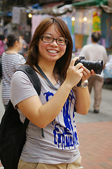 Image showing Asian woman photographer