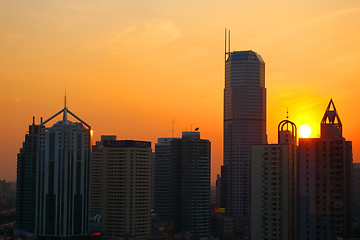 Image showing Shanghai sunset with skyscrapers background