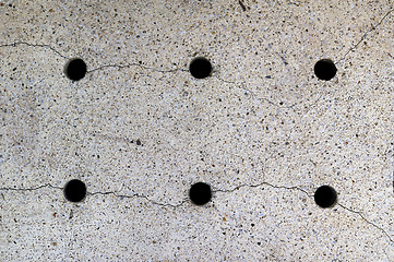 Image showing Six holes on the ground