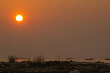 Image showing Beautiful sunset along seashore in Hong Kong