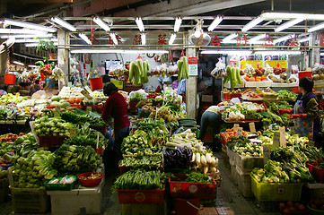 Image showing A wet marketing selling vegetables