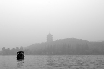 Image showing Traditional wooden row boat on famous West Lake, Hangzhou, China