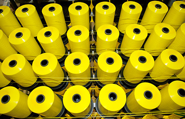 Image showing Coils of yellow threads