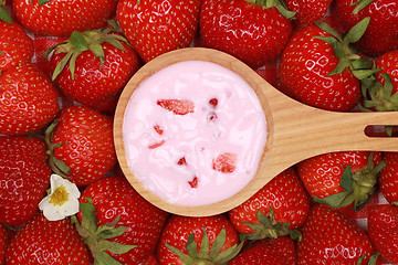 Image showing Strawberry yogurt on a spoon