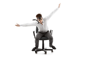 Image showing Funny young man on chair