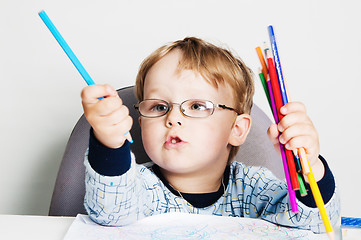 Image showing Portrait of the little boy with pencils