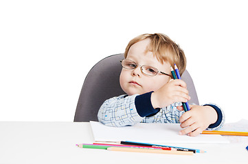 Image showing Portrait of the little boy with pencils