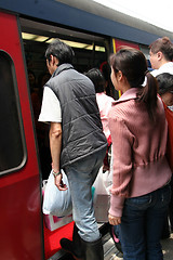 Image showing People boarding a train