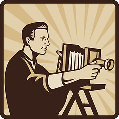 Image showing Photographer Shooting Vintage Camera Retro