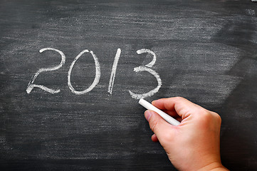 Image showing 2013 written with chalk on a smudged blackboard