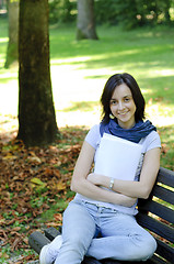 Image showing College student on a bench