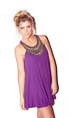 Image showing Attractive blonde in purple dress