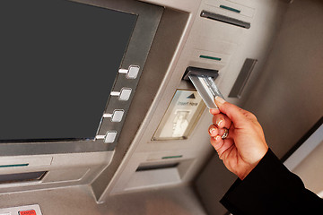 Image showing Woman using an ATM