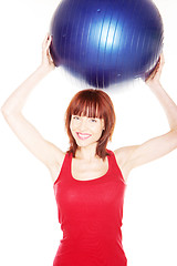 Image showing Smiling Woman Holding Pilates Ball