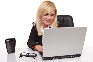 Image showing Blonde businesswoman chatting on her mobile