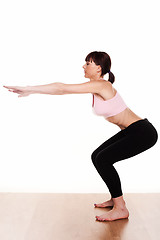 Image showing woman doing a squat exercise