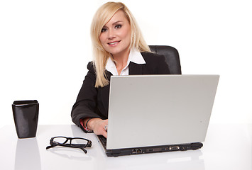 Image showing Efficient businesswoman working on her laptop