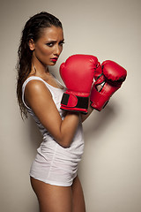 Image showing Sexy woman with red boxing gloves