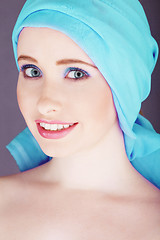 Image showing Cute woman with blue headscarf