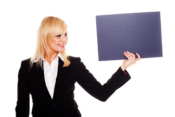 Image showing Stylish woman holding up a grey card