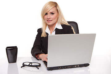 Image showing Efficient businesswoman working on her laptop