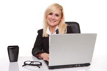 Image showing Efficient businesswoman working on her laptop