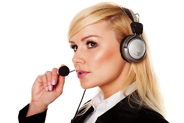 Image showing Woman wearing headphones and microphone