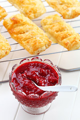 Image showing Homemade strawberry jam with apple turnovers