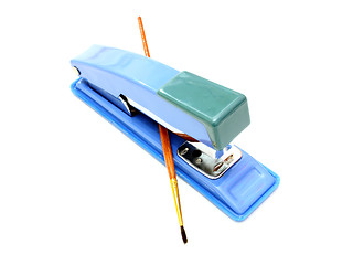 Image showing Stapler and brush