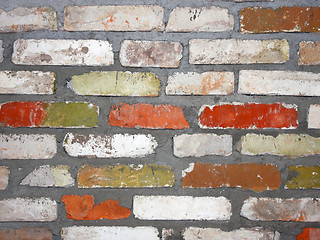 Image showing Old wall consisting of bricks of different color
