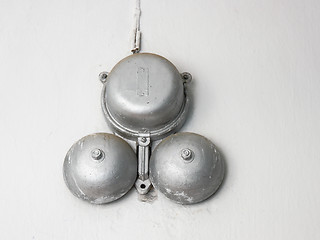 Image showing Big old silvery school bell