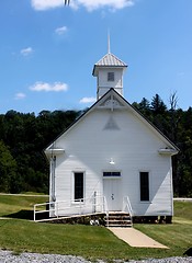 Image showing Old fashion white church with steeple