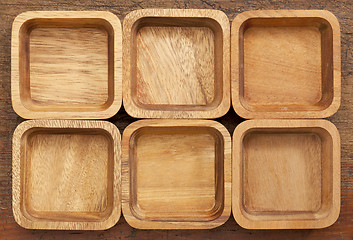 Image showing six square wooden bowls