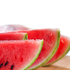 Image showing fresh watermelon on a  wood table