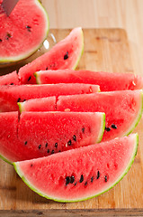 Image showing fresh watermelon on a  wood table