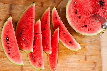 Image showing fresh watermelon on a  wood table