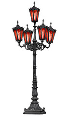 Image showing Old cast iron lamp post with red glass