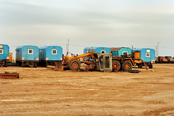 Image showing Temporary site office and machinery