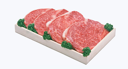 Image showing the pieces of raw meat in box isolated