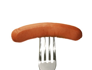 Image showing Close up of sausage and fork isolated